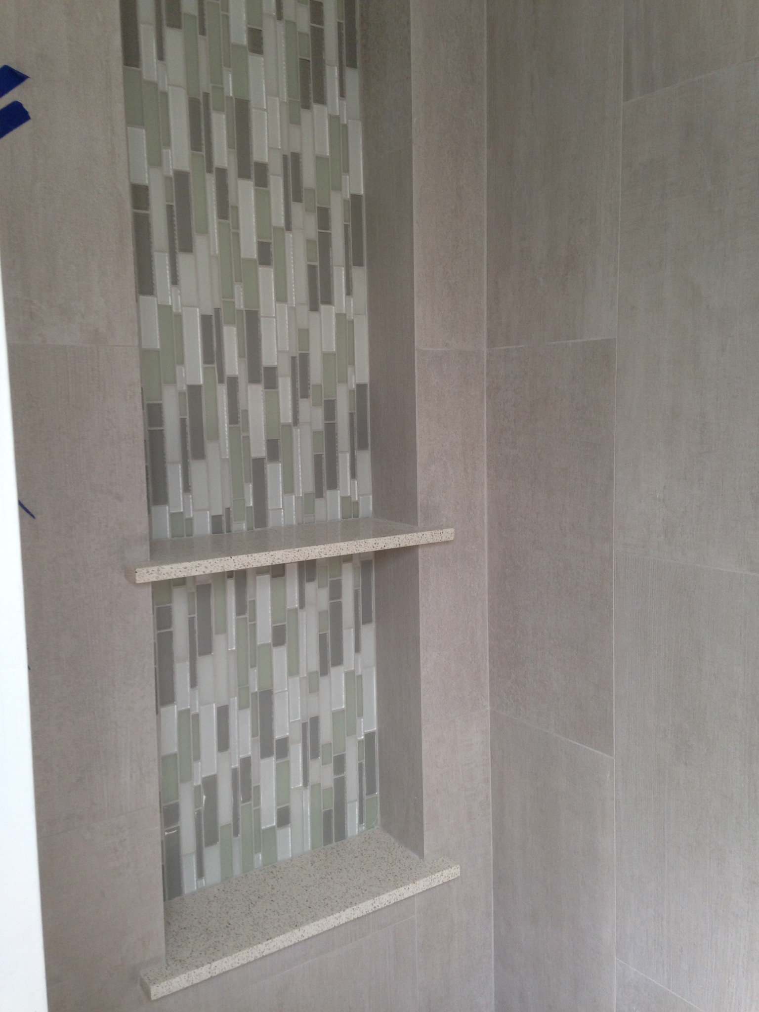 Small bath shower niche & wall