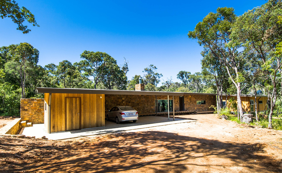 Photo of a contemporary one-storey brown house exterior in Perth with wood siding, a flat roof and a metal roof.