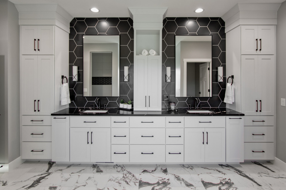 Transitional master multicolored floor and double-sink bathroom photo with recessed-panel cabinets, white cabinets, an undermount sink and a built-in vanity