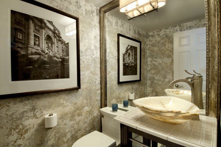 This is an example of a transitional powder room in Phoenix.