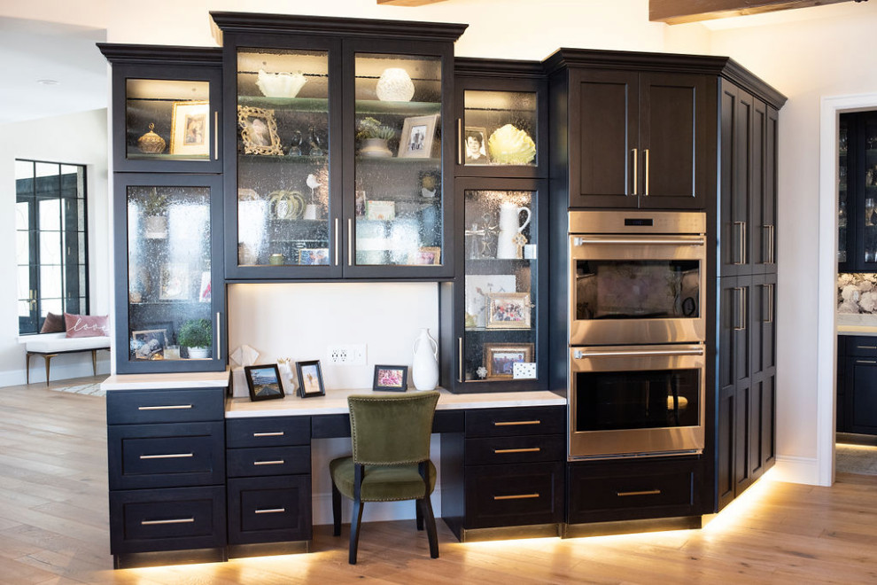 Example of a transitional kitchen design in Denver