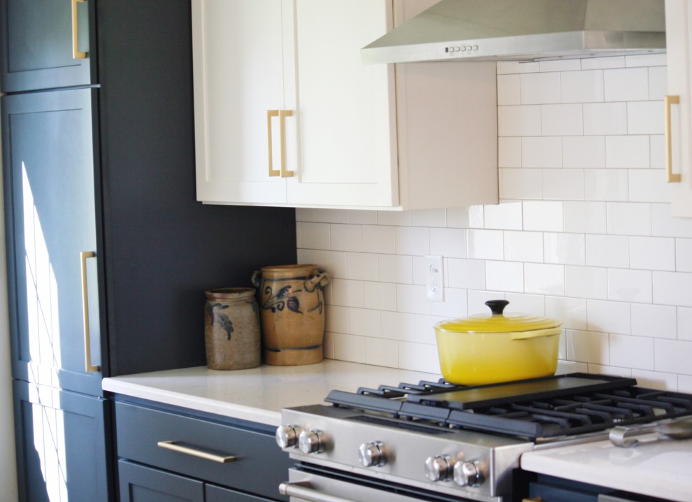 Inspiration for a transitional gray floor kitchen remodel with a farmhouse sink, quartz countertops and stainless steel appliances