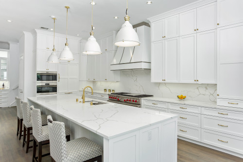 Transitional condo kitchen with bright cabinetry, island seating, and modern lighting — low price kitchen cabinet inspiration.