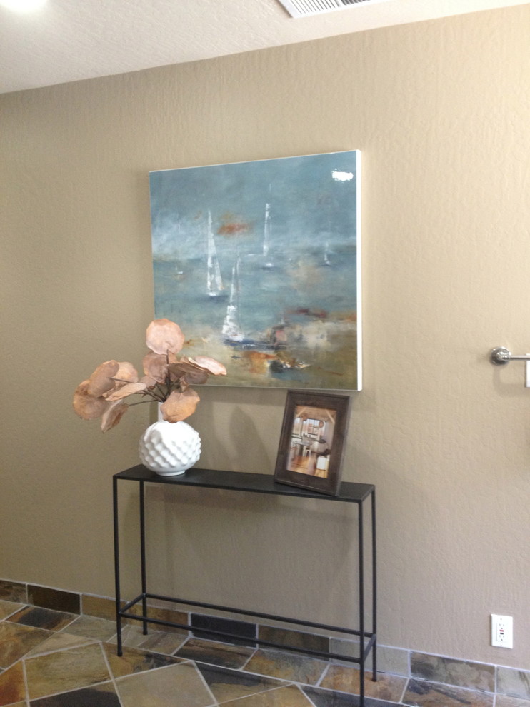 Inspiration for a mid-sized transitional master beige tile, brown tile and travertine tile travertine floor and beige floor bathroom remodel with flat-panel cabinets, dark wood cabinets, beige walls, an undermount sink and quartz countertops