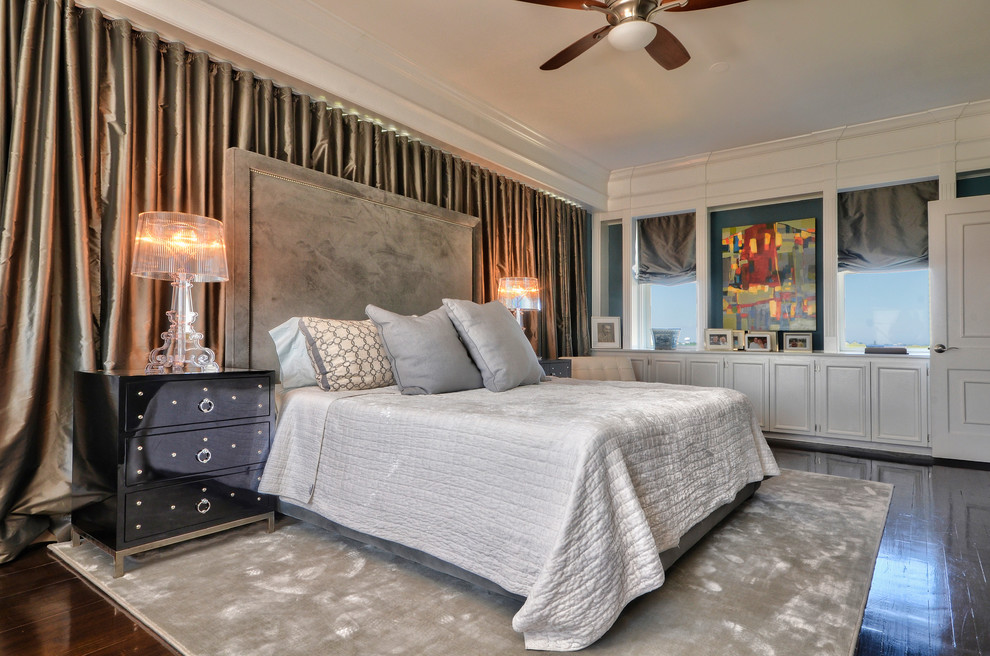 Design ideas for a large contemporary master bedroom in Tampa with dark hardwood floors, no fireplace and blue walls.