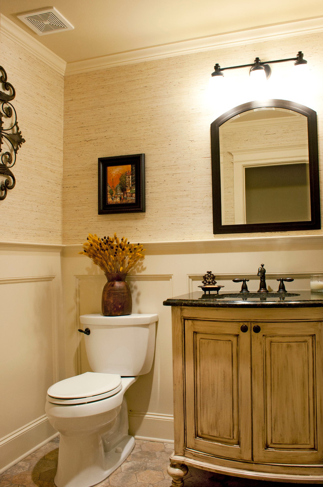 Inspiration for a small traditional 3/4 bathroom in Dallas with an undermount sink, furniture-like cabinets, distressed cabinets, granite benchtops, beige tile, stone tile, beige walls and terra-cotta floors.