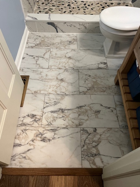 Bathroom with full tile shower