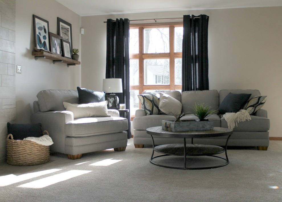 Photo of a large country living room in New York with grey walls and carpet.