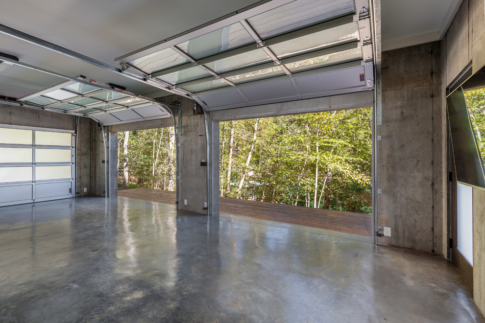 Design ideas for a contemporary attached garage in Charleston.