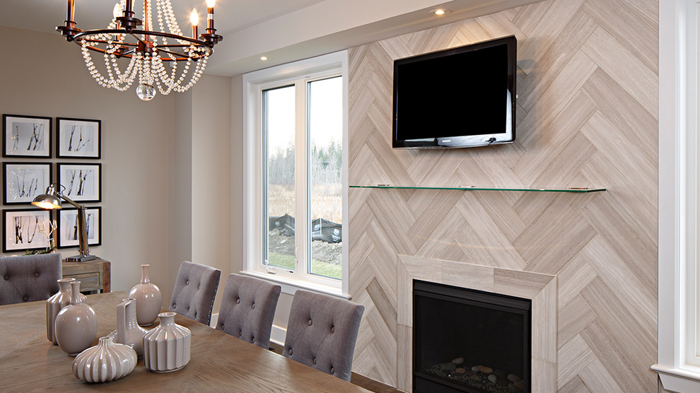 Design ideas for a mid-sized contemporary separate dining room in Calgary with beige walls, a standard fireplace and a tile fireplace surround.
