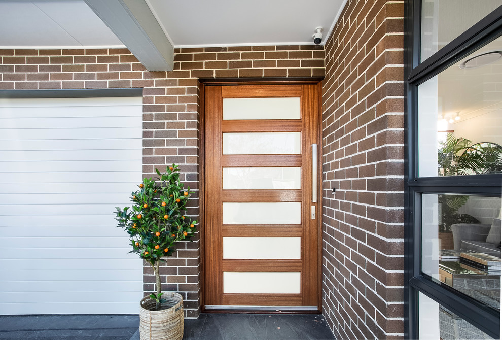 This is an example of a contemporary front door in Sydney with a single front door.