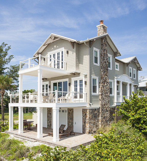 This is an example of a beach style exterior in Tampa.