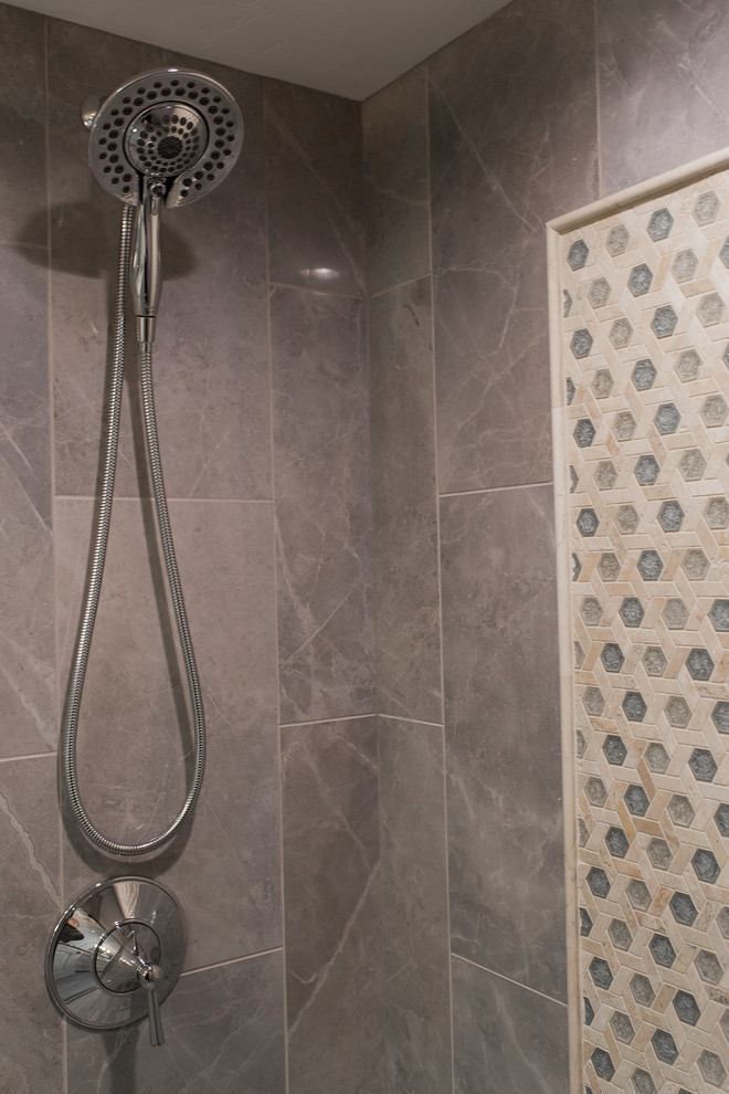 Example of a small transitional gray tile and porcelain tile porcelain tile alcove shower design in Miami with a two-piece toilet and an undermount sink