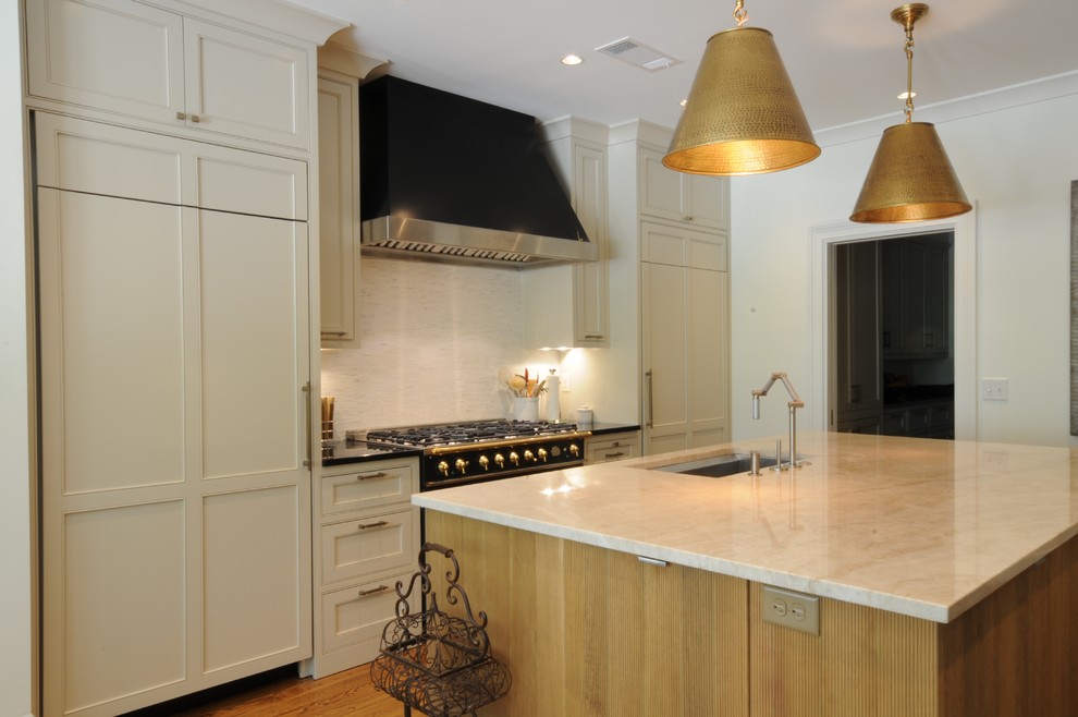 Inspiration for a large transitional u-shaped dark wood floor and brown floor open concept kitchen remodel in Birmingham with an undermount sink, shaker cabinets, white cabinets, granite countertops, white backsplash, mosaic tile backsplash, paneled appliances and an island