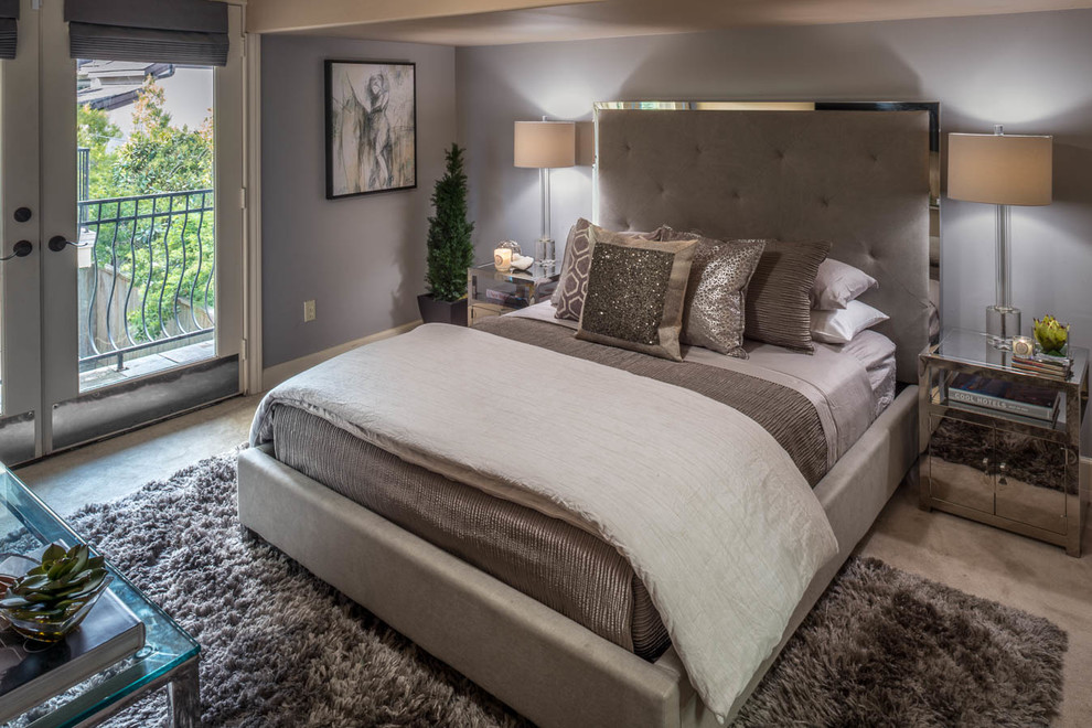 This is an example of a mid-sized modern guest bedroom in Houston with grey walls, carpet and no fireplace.