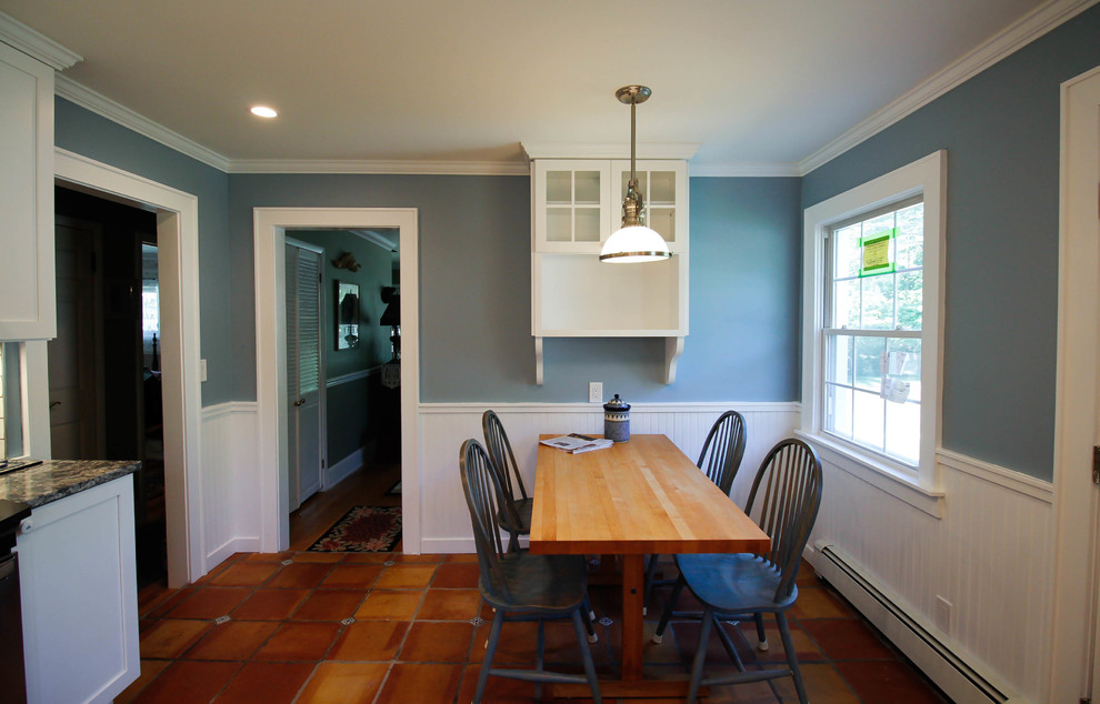 Mid-sized country separate dining room in Newark with terra-cotta floors.