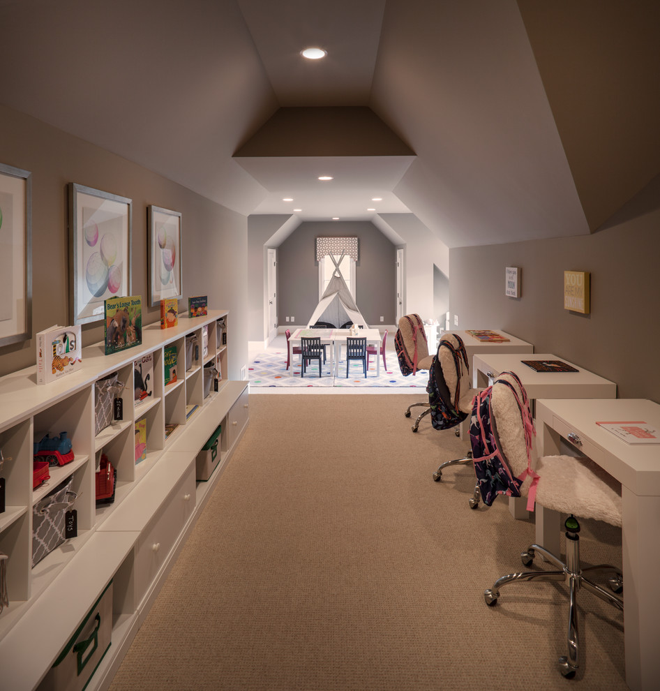 Design ideas for a mid-sized transitional gender-neutral kids' playroom for kids 4-10 years old in Charlotte with carpet, grey walls and beige floor.