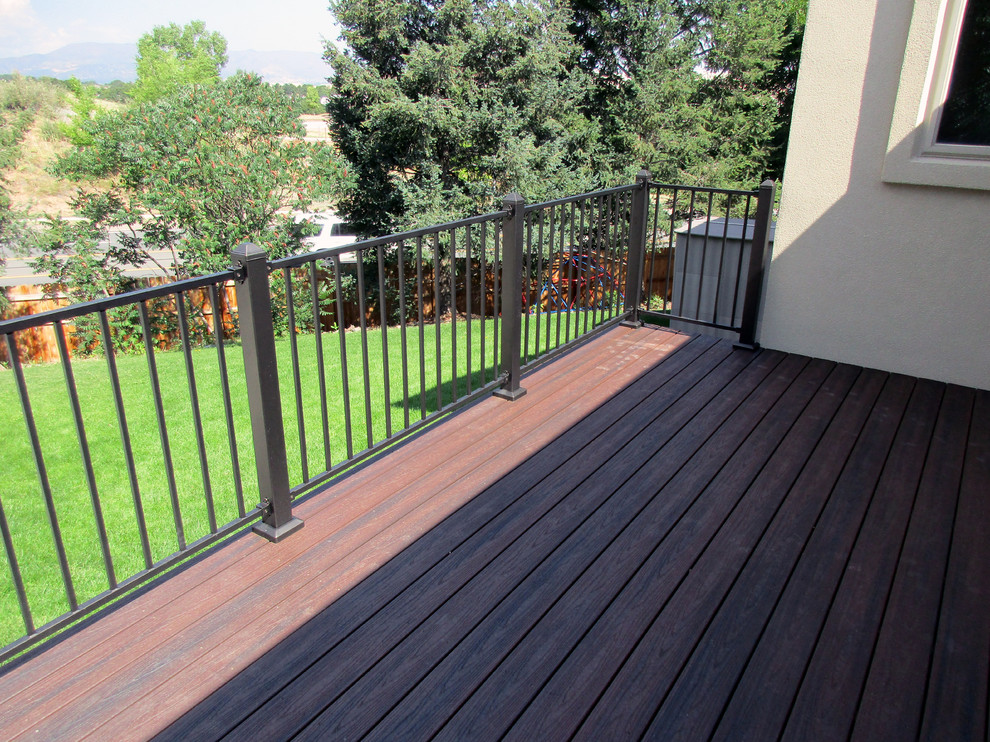 Example of a mid-sized backyard deck design in Denver
