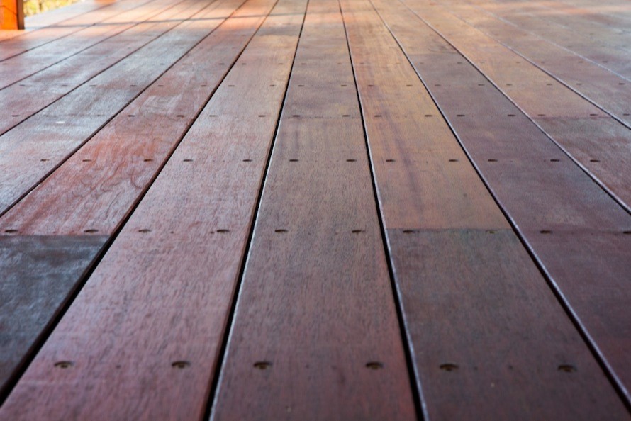 Photo of a large country backyard deck in Sydney with no cover.