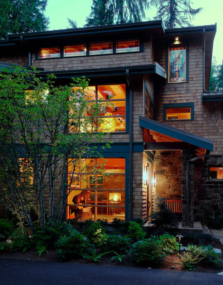 Photo of a contemporary exterior in Seattle with wood siding.