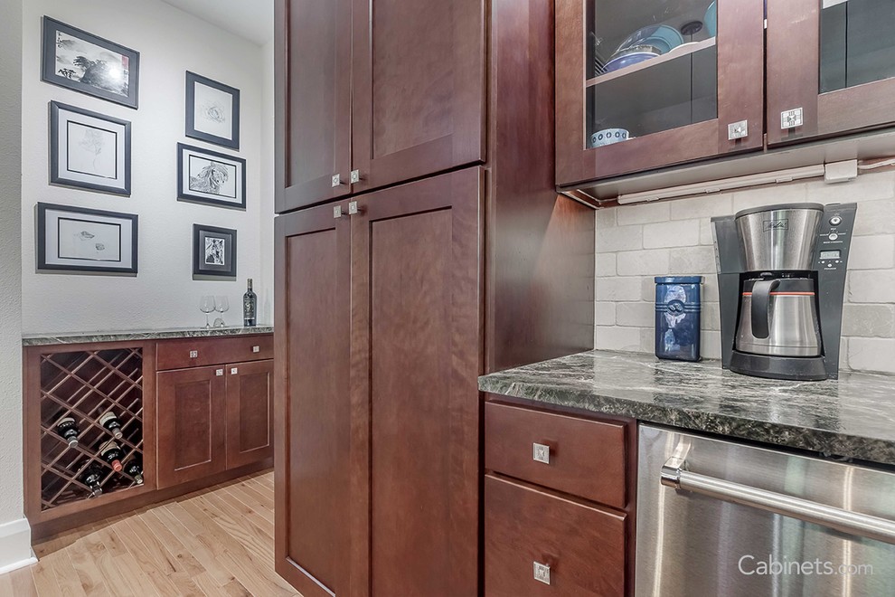Example of a minimalist kitchen design in Tampa with shaker cabinets and red cabinets