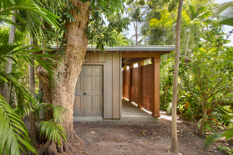 Photo of a mid-sized tropical detached garden shed in Miami.