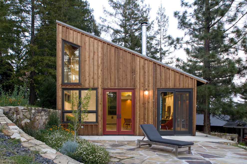 Design ideas for a contemporary exterior in San Francisco with wood siding and a shed roof.