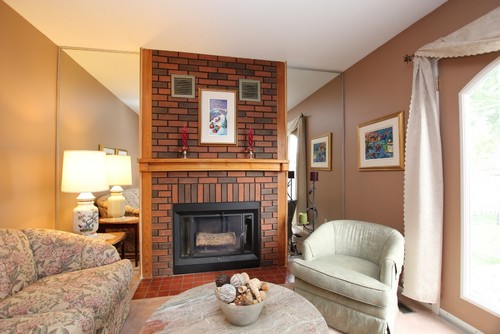 Any fireplace experts out there on Houzz? need help with ugly vents! We purchased this home built in 1980 and we