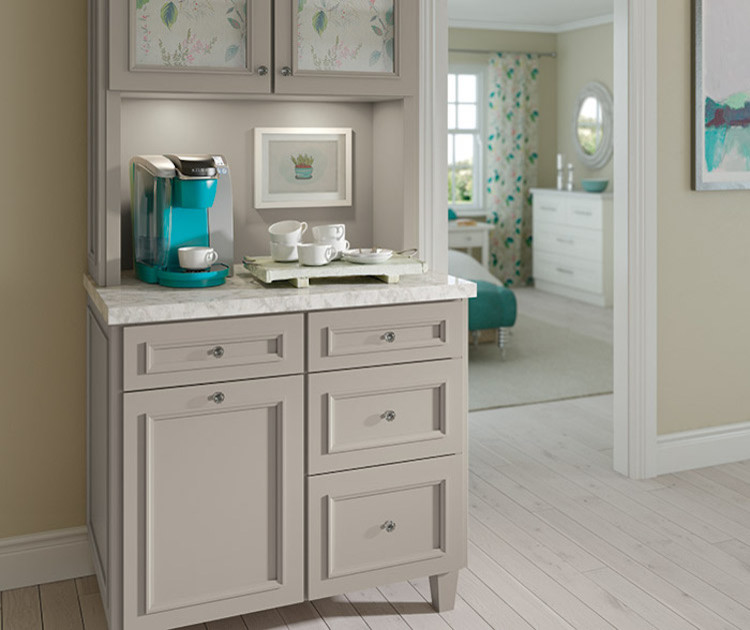 Inspiration for a small transitional single-wall painted wood floor and beige floor home design remodel in Orange County with no sink, beaded inset cabinets, beige cabinets, marble countertops and beige backsplash
