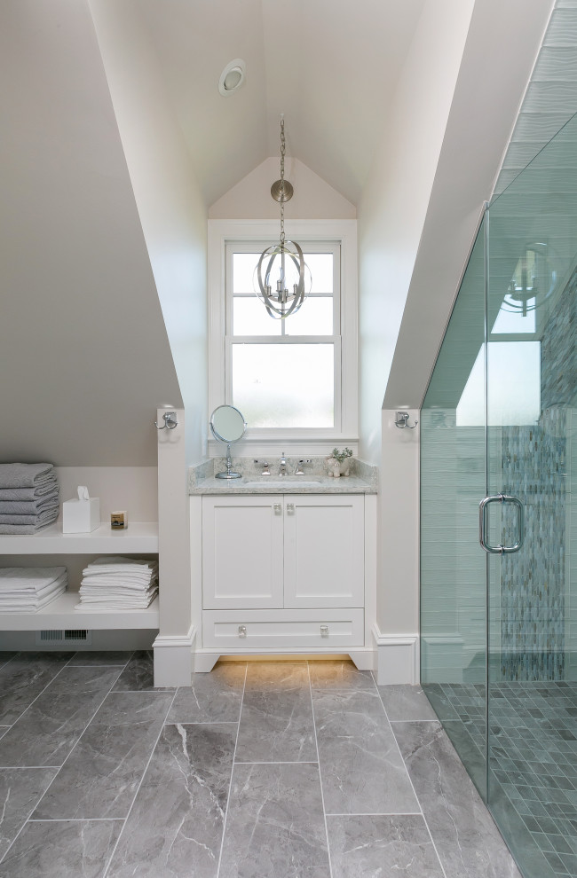 Beach style bathroom in Charleston with shaker cabinets, white cabinets, a curbless shower, grey walls, an undermount sink, grey floor, a hinged shower door, grey benchtops, a single vanity, a built-in vanity and vaulted.