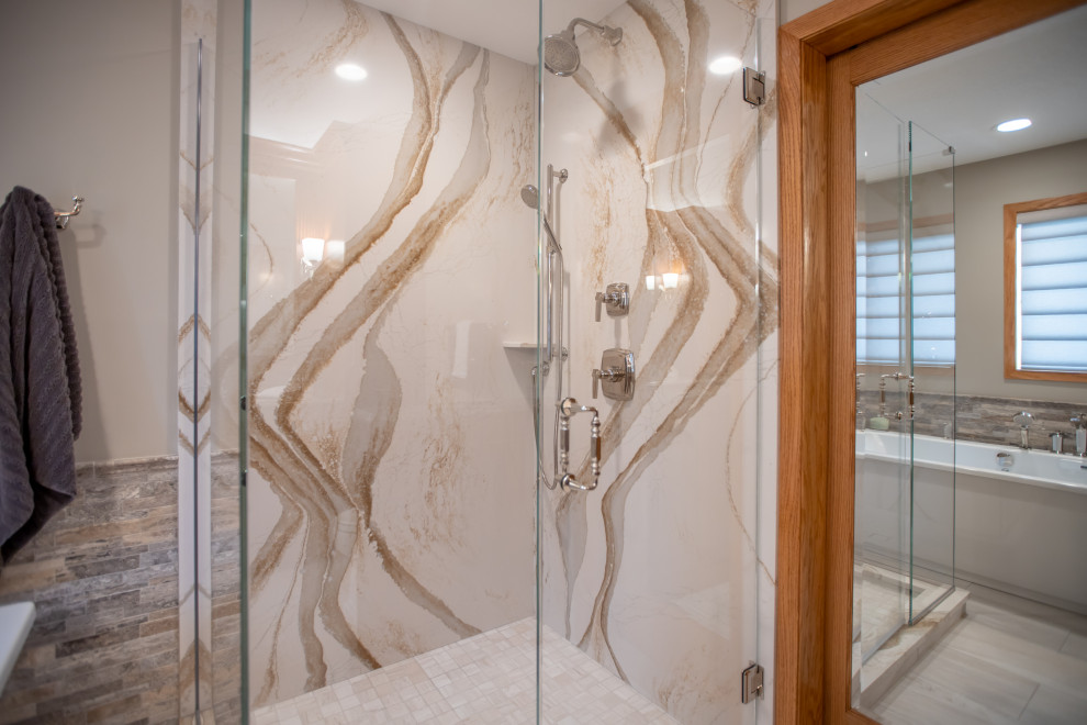 Design ideas for a mid-sized transitional master bathroom in Minneapolis with raised-panel cabinets, medium wood cabinets, a freestanding tub, beige walls, an undermount sink, engineered quartz benchtops, a hinged shower door, beige benchtops, a single vanity and a built-in vanity.