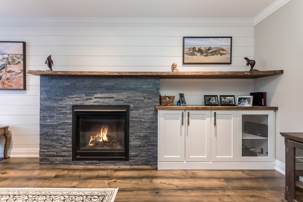 Inspiration for a large transitional galley dark wood floor and brown floor eat-in kitchen remodel with an undermount sink, shaker cabinets, white cabinets, quartz countertops, multicolored backsplash, mosaic tile backsplash, stainless steel appliances, an island and multicolored countertops