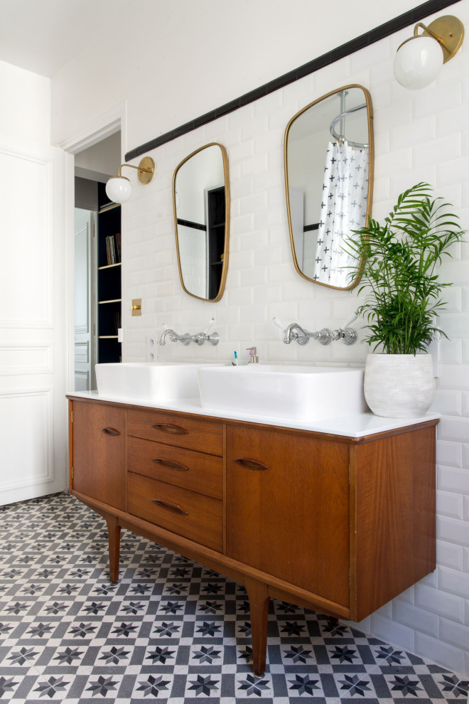 Inspiration for a large contemporary 3/4 bathroom in Paris with medium wood cabinets, white tile, white walls, a vessel sink, multi-coloured floor, white benchtops, a double vanity, a freestanding vanity and flat-panel cabinets.