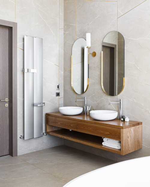 Wood Vanity with Oval Mirrors and Large Format Tiles