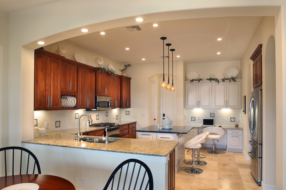 Example of an enclosed kitchen design in Phoenix with a drop-in sink and open cabinets