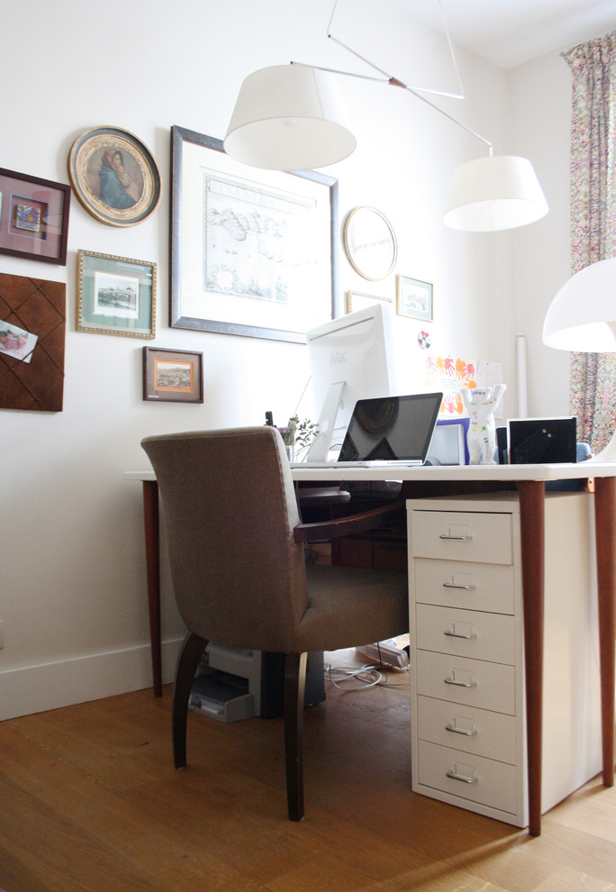 This is an example of an eclectic home office in Amsterdam.
