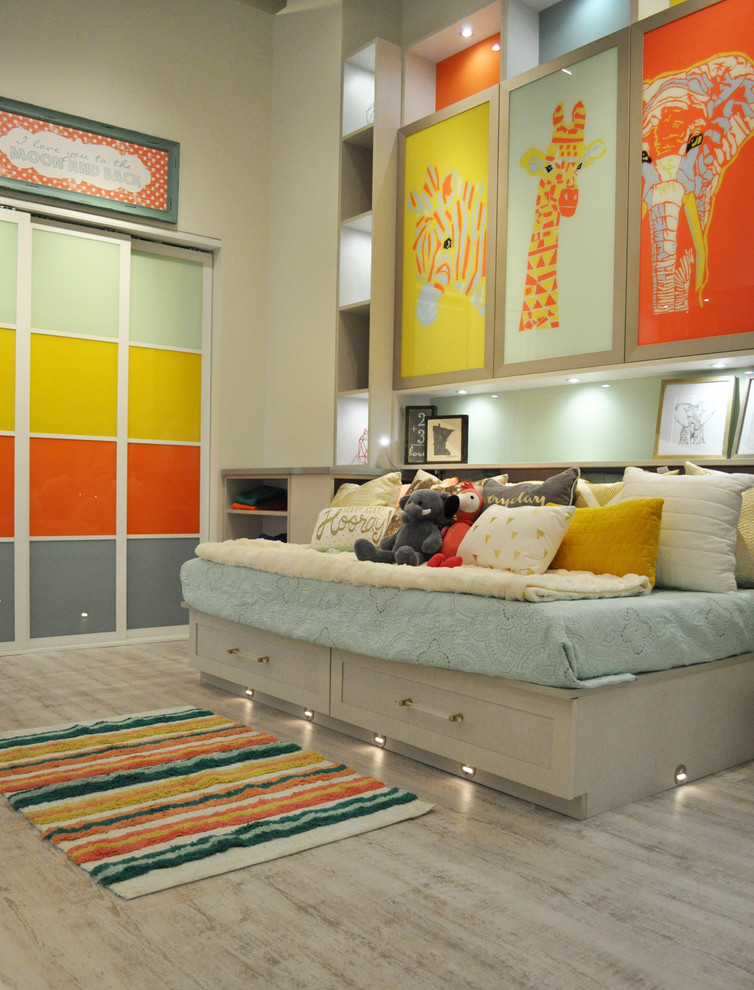 This is an example of a large eclectic master bedroom in Minneapolis with vinyl floors.
