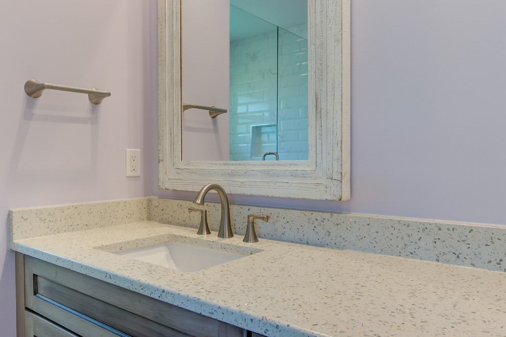 Inspiration for a small transitional kids' home design remodel with furniture-like cabinets, gray cabinets, recycled glass countertops and white countertops