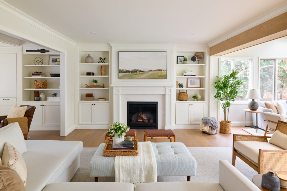 Design ideas for an expansive beach style formal open concept living room in New York with white walls, a standard fireplace, a stone fireplace surround and medium hardwood floors.