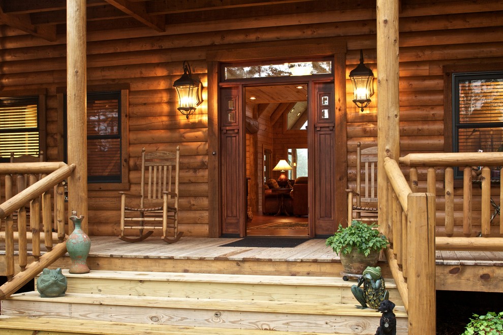 Mountain style single front door photo in Atlanta with a dark wood front door