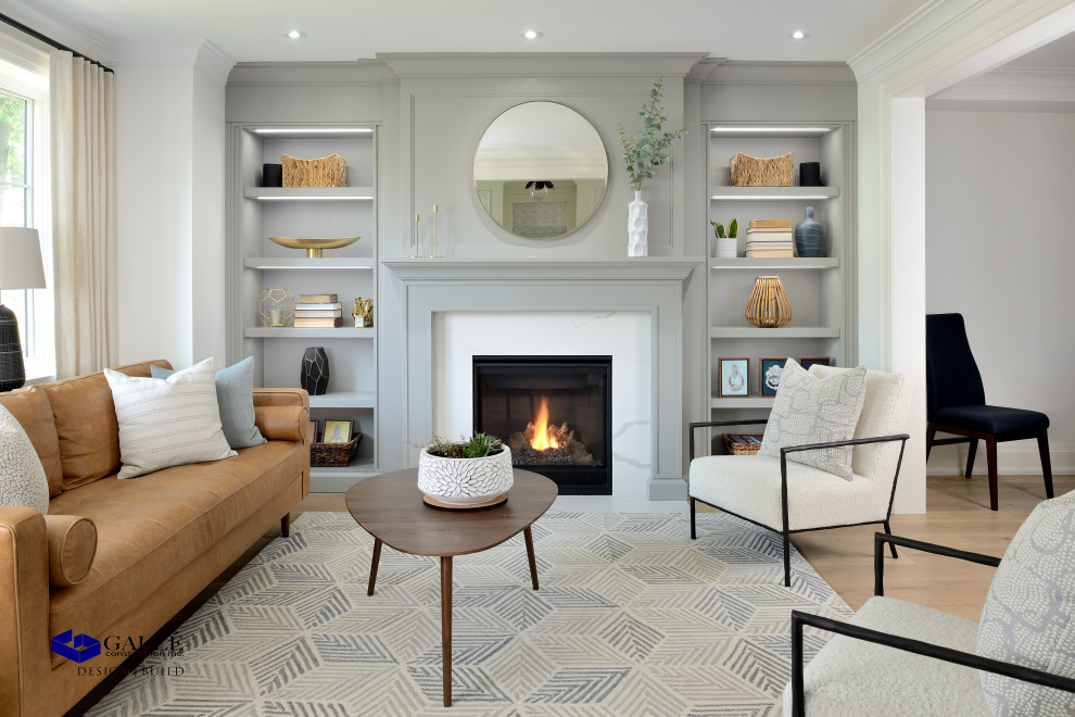 Design ideas for a mid-sized traditional open concept living room in Toronto with a standard fireplace and a stone fireplace surround.
