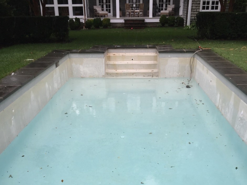 Pool - mid-sized transitional backyard rectangular pool idea