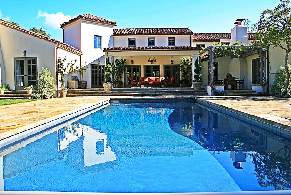 Design ideas for a mediterranean patio in Santa Barbara with a pergola.