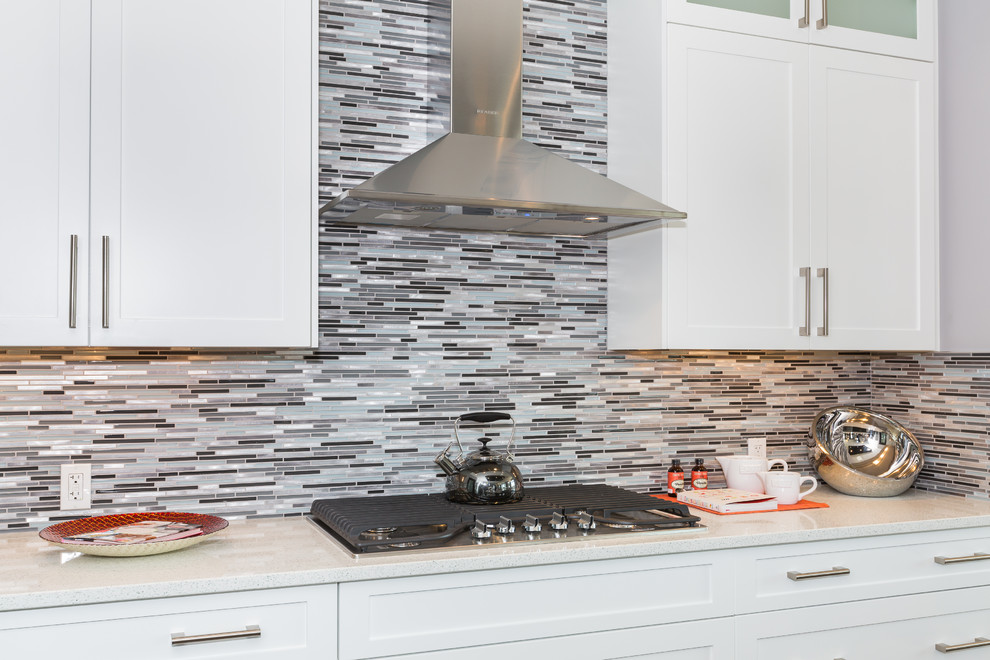 Inspiration for a transitional kitchen remodel in Calgary with multicolored backsplash and glass tile backsplash