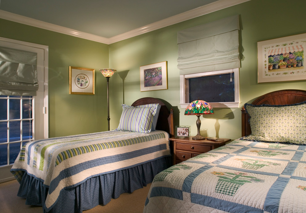 Inspiration for a mid-sized arts and crafts guest bedroom in Raleigh with green walls and carpet.