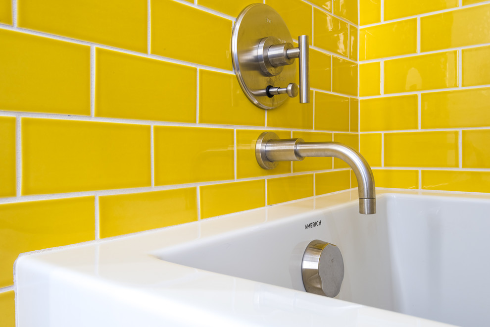Large midcentury kids bathroom in Los Angeles with shaker cabinets, white cabinets, a freestanding tub, an alcove shower, yellow tile, subway tile, white walls, mosaic tile floors, an undermount sink, engineered quartz benchtops, orange floor and a hinged shower door.