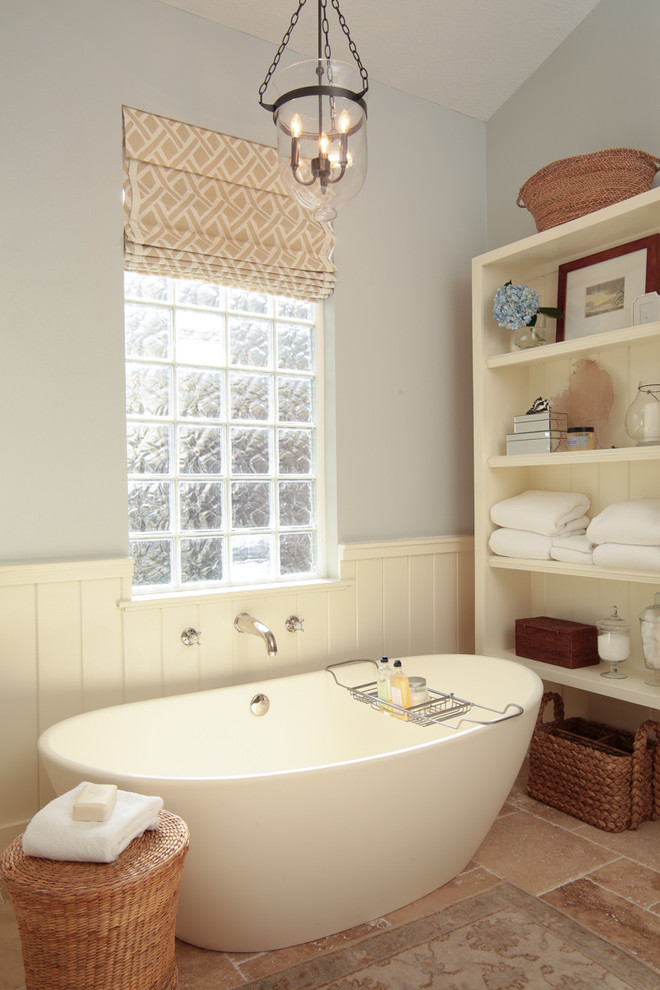 Traditional bathroom in Jacksonville with a freestanding tub.