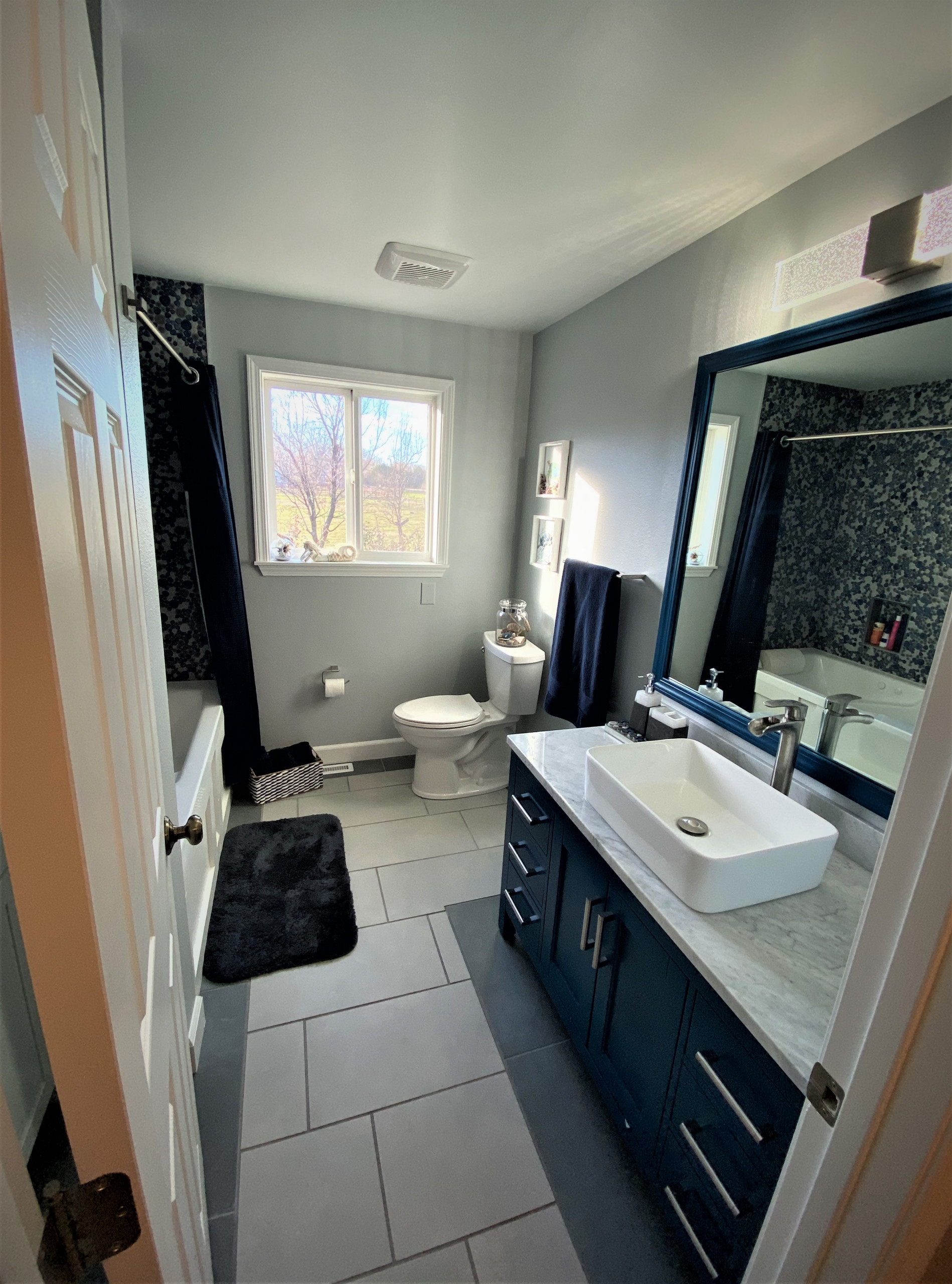 Contemporary coastal inspired bathroom