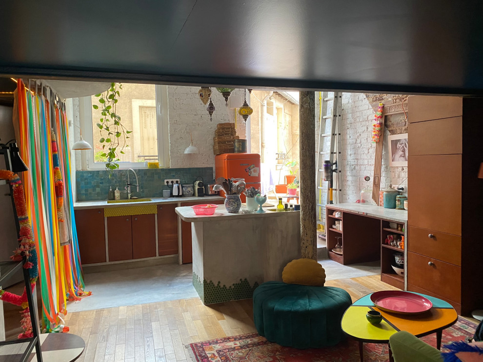 Transformation d'un local en loft brutaliste tropical