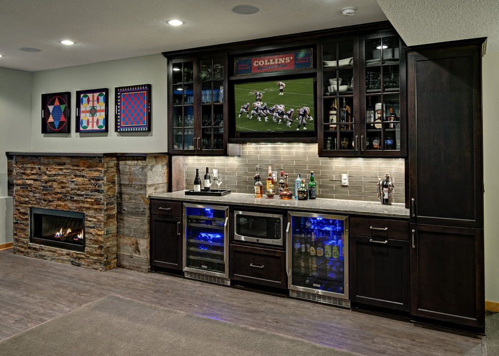 Design ideas for a mid-sized transitional home bar in Minneapolis with vinyl floors.